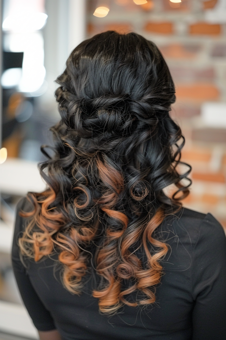 Half-up half-down weave style with curly ombre hair extensions.