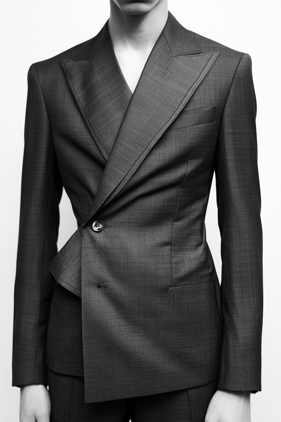 Men's creative style. Angular line work on a charcoal grey suit.